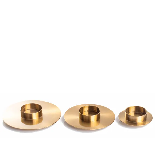 BEJART gold candleholders — trio of heights for layered lighting.