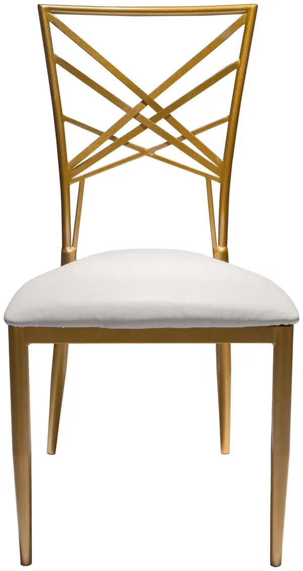 Gold lattice-back chair with a white eco-leather seat styled in a bright event space with modern décor and natural light.