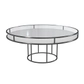Black round CORNELL table with white plastic shelf and clear glass top